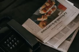 phone and newspaper